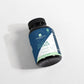 Bottle of Alpha Energy capsules on a light gray background